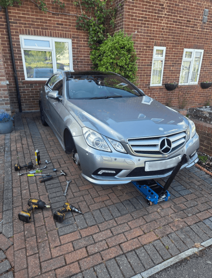 Mechanic working on a car